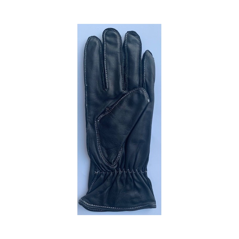 Paume d’un gant en cuir de mouton noir pour femme, piqûres claires et poignet froncé